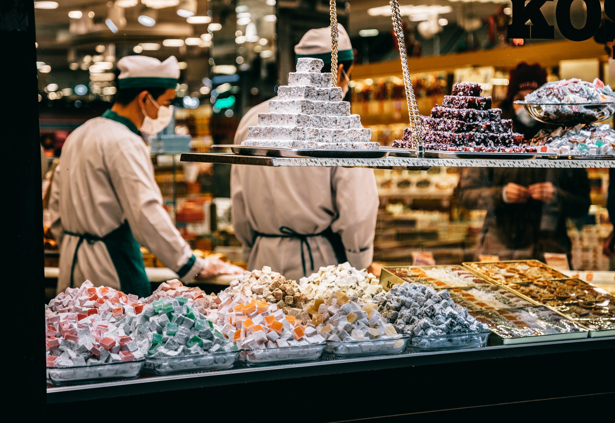 Traditional oriental sweets placed on candy shop showcase